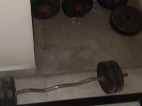 Dumbell and road along with weight
