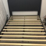 Black Queen bed frame with headboard