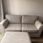 Two seater sofa with footstool