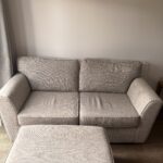 Two seater sofa with footstool