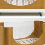 Beautiful Ubabub Pod Cot 2-1 convertible Bed with Junior Bed Conversion Kit in natural wood.